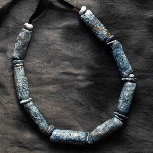 Necklace with Sculpted Blue Beads and Gold Leaf.